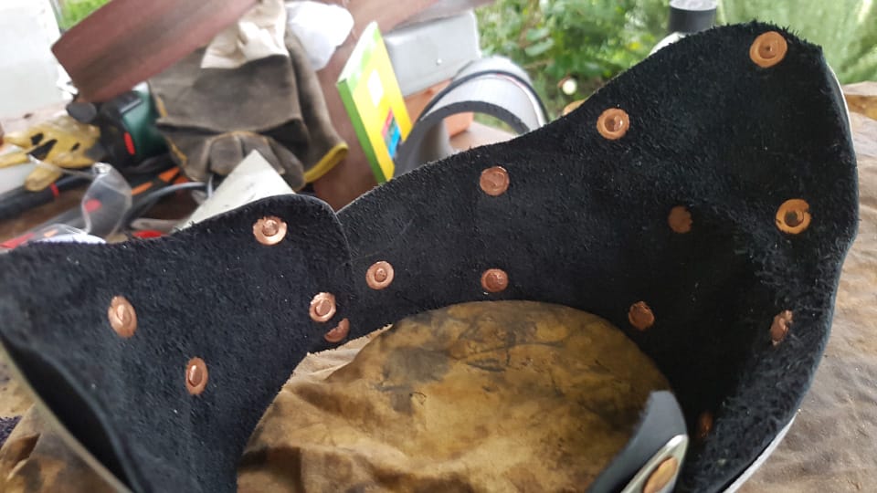 Copper rivets are all set in place