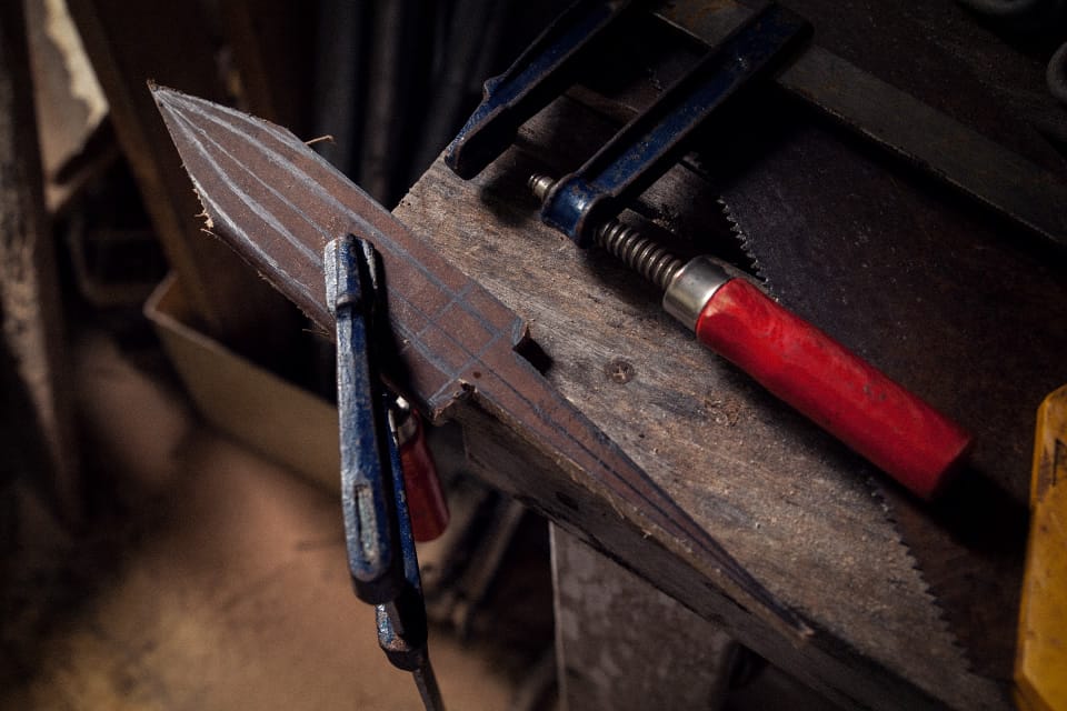 The rough shape cat with the hand saw. 