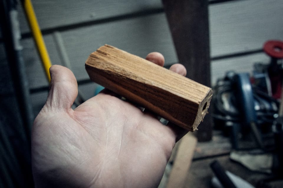 A lump of kindling pine takes shape as the handle.