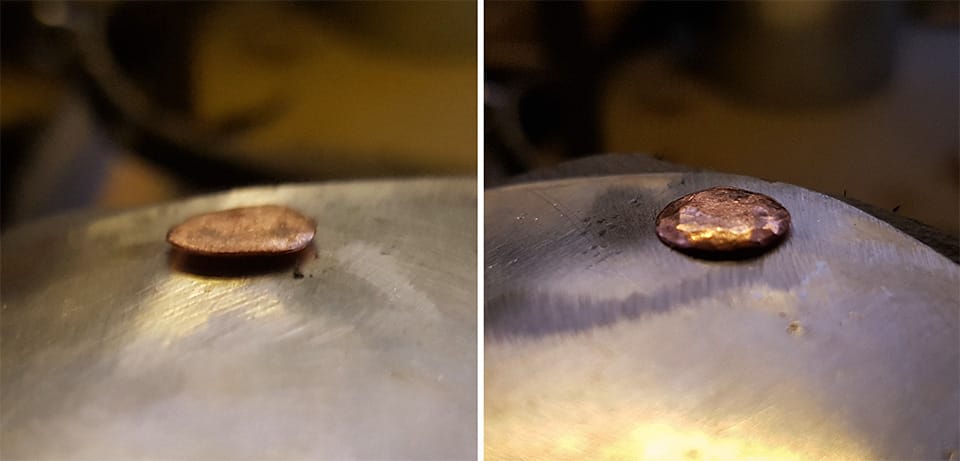 A nicely peened copper rivet.