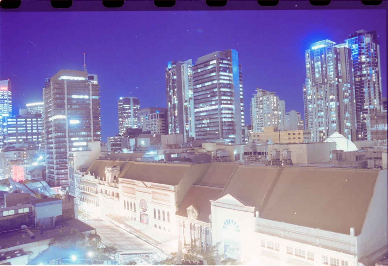 Original Queen St Mall Myer Centre roof line hidden below the Brisbane city skyline. Kodak Porta 160